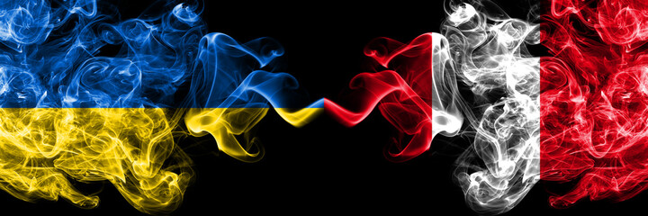 Ukraine, Ukrainian vs Peru, Peruvian smoky mystic flags placed side by side. Thick colored silky abstract smokes flags.