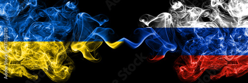 Ukraine, Ukrainian vs Russia, Russian smoky mystic flags placed side by side. Thick colored silky abstract smokes flags.