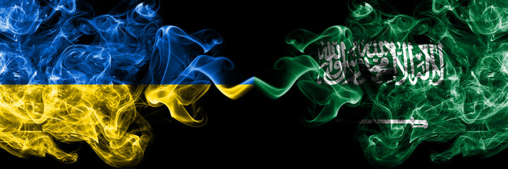 Ukraine, Ukrainian vs Saudi Arabia, Arabian smoky mystic flags placed side by side. Thick colored silky abstract smokes flags.