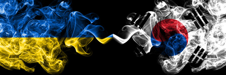 Ukraine, Ukrainian vs South Korea, Korean smoky mystic flags placed side by side. Thick colored silky abstract smokes flags.