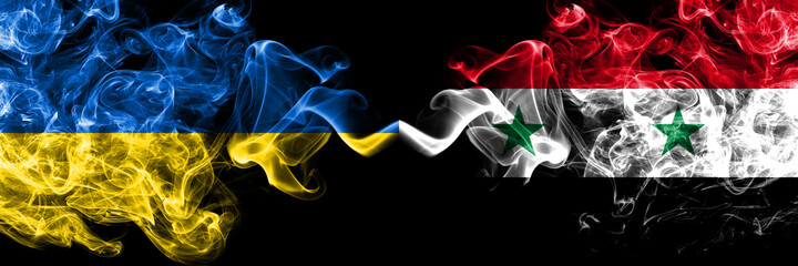 Ukraine, Ukrainian vs Syria, Syrian smoky mystic flags placed side by side. Thick colored silky abstract smokes flags.