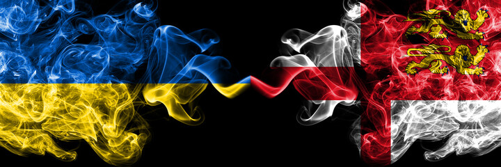 Ukraine, Ukrainian vs United Kingdom, Great Britain, British, Sark smoky mystic flags placed side by side. Thick colored silky abstract smokes flags.