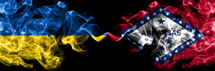 Ukraine, Ukrainian vs United States of America, America, US, USA, American, Arkansas, Arkansan smoky mystic flags placed side by side. Thick colored silky abstract smokes flags.