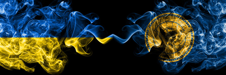 Ukraine, Ukrainian vs United States of America, America, US, USA, American, Atlanta, Georgia smoky mystic flags placed side by side. Thick colored silky abstract smokes flags.