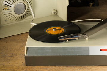 Old record player playing a vinyl