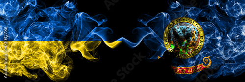 Ukraine, Ukrainian vs United States of America, America, US, USA, American, Idaho smoky mystic flags placed side by side. Thick colored silky abstract smokes flags.