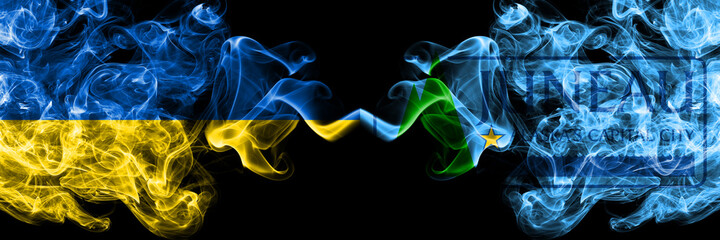 Ukraine, Ukrainian vs United States of America, America, US, USA, American, Juneau, Alaska smoky mystic flags placed side by side. Thick colored silky abstract smokes flags.