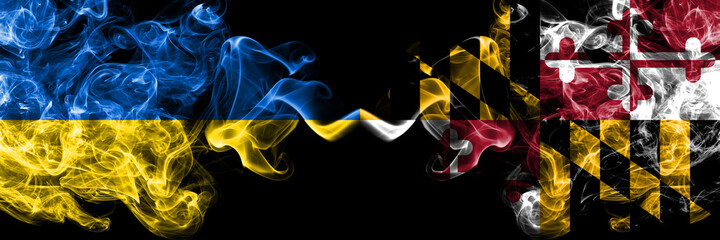 Ukraine, Ukrainian vs United States of America, America, US, USA, American, Maryland smoky mystic flags placed side by side. Thick colored silky abstract smokes flags.