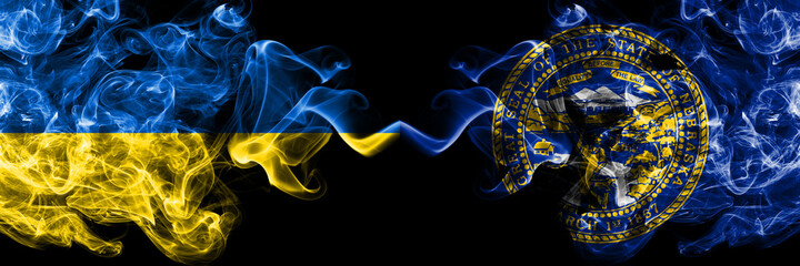Ukraine, Ukrainian vs United States of America, America, US, USA, American, Nebraska smoky mystic flags placed side by side. Thick colored silky abstract smokes flags.