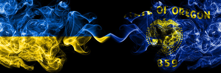 Ukraine, Ukrainian vs United States of America, America, US, USA, American, Oregon smoky mystic flags placed side by side. Thick colored silky abstract smokes flags.