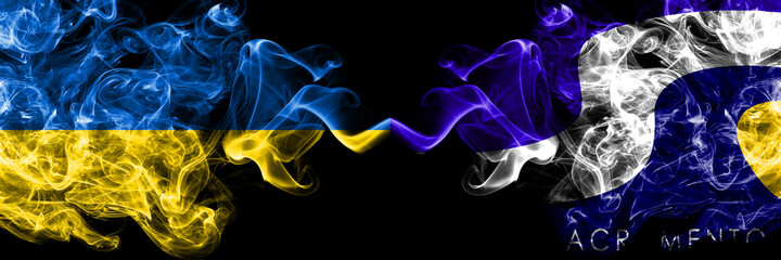 Obraz premium Ukraine, Ukrainian vs United States of America, America, US, USA, American, Sacramento, California smoky mystic flags placed side by side. Thick colored silky abstract smokes flags.