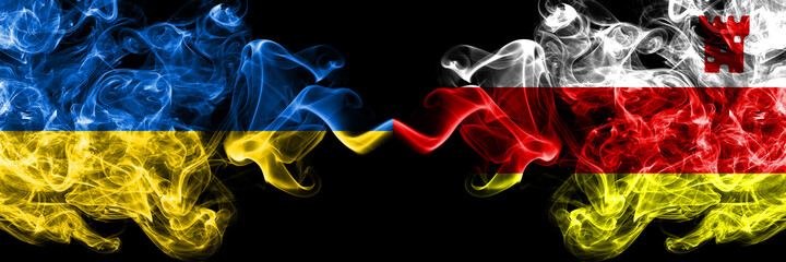 Ukraine, Ukrainian vs United States of America, America, US, USA, American, Santa Barbara, California smoky mystic flags placed side by side. Thick colored silky abstract smokes flags.