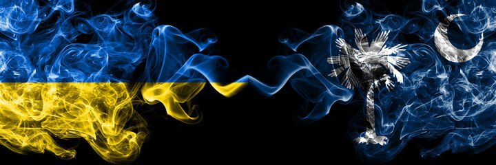 Ukraine, Ukrainian vs United States of America, America, US, USA, American, South Carolina smoky mystic flags placed side by side. Thick colored silky abstract smokes flags.