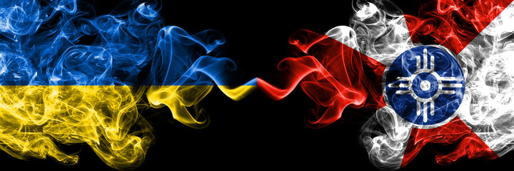 Fototapeta premium Ukraine, Ukrainian vs United States of America, America, US, USA, American, Wichita, Kansas smoky mystic flags placed side by side. Thick colored silky abstract smokes flags.