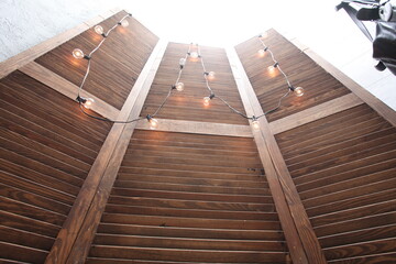 wooden screen decorated with light bulbs