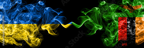 Ukraine, Ukrainian vs Zambia, Zambian smoky mystic flags placed side by side. Thick colored silky abstract smokes flags.