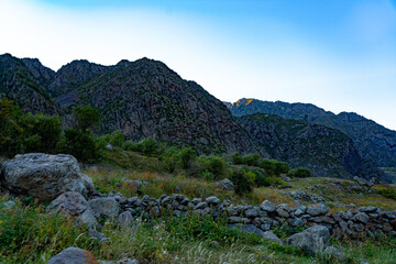 Fototapeta na wymiar view of rocks and mountains and grass