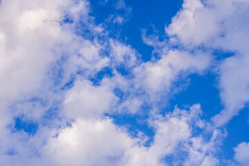 Blue sky with white clouds abstract background or texture.