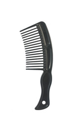 Black plastic comb on white background, close up image