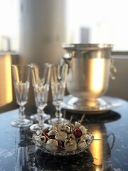Appetizer with Champagne, cherry tomatoes and buffalo mozzarella