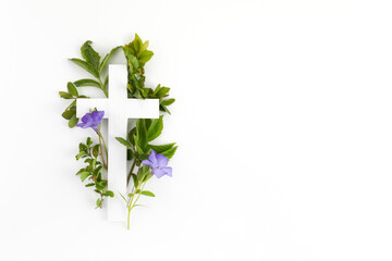 The Christianity cross of green leaves. Baptism, Easter, church holiday background - 431041777