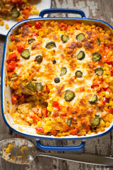 Chicken gyros bake with rice, corn, red pepper and gherkins