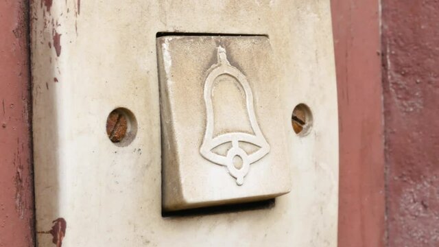 Simple old retro doorbell bell symbol button detail, macro, extreme closeup, nobody. Entrance door house bell signal system vintage antique switch object, bell icon, waiting to enter abstract concept