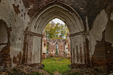 The ruins of an old abandoned church. A large ruined old building of church.