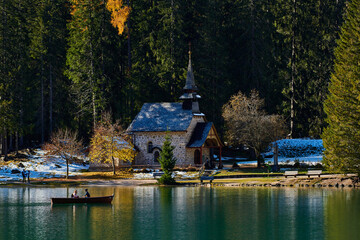 The beautiful Braies lake in late autumn with a little snow, Pearl of the Dolomite lakes is an UNESCO heritage and is located in the Braies Alto Adige,Italy