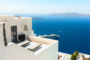 White architecture on Santorini island, Greece. Beautiful terrace with sea view. Famous travel destination