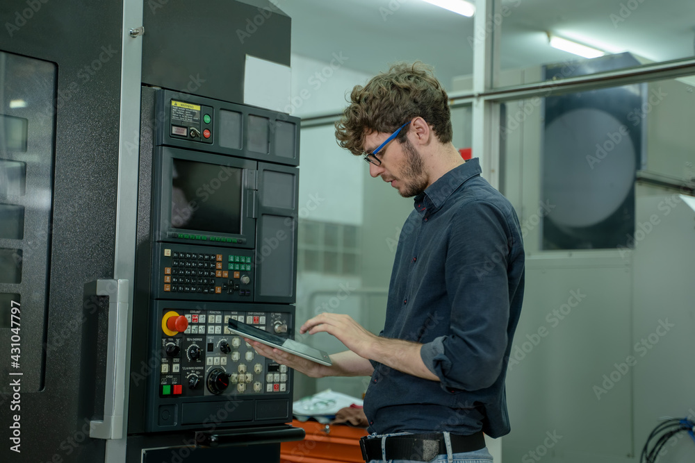 Poster factory technicians checking and the machine in factory,work at manufacturing plant factory,technica