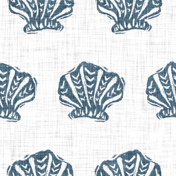 Blue scallop shell block print on a soft white linen texture background. Seamless bright summer cloth fabric for fresh coastal cottage beach decor. Modern stylised marine sea life hand drawn linocut

