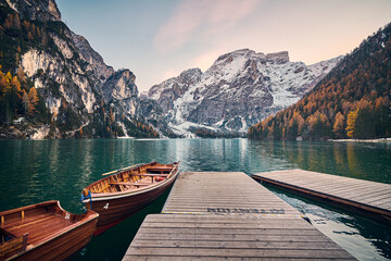 Obraz premium The beautiful Braies lake in late autumn with a little snow, Pearl of the Dolomite lakes is an UNESCO heritage and is located in the Braies Alto Adige,Italy