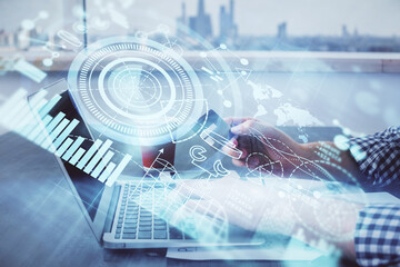 Double exposure of man hands holding a credit card and internet business theme drawing. Digital fintech and E-commerce concept.