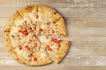 pizza with meat and tomatoes