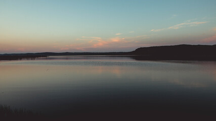 Fototapeta na wymiar Fishing lake at sunrise