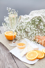 Сhilled white wine in a glass. cozy evening on the terrace. Summertime relax on the sunny patio.