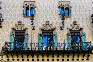 Building facade: Old style windows, balcony. Barcelona, Catalonia, Spain.
