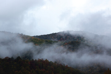 Mountain with morning clouds and mist