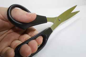 Scissors for cutting paper with white background