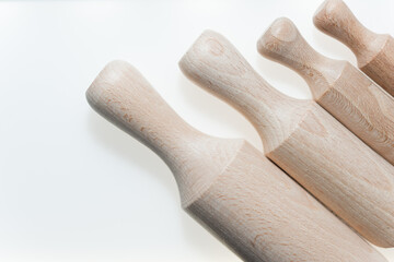 plain beech wood scoops on a white background with slight shadow