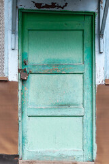 old wooden turquoise door, upright, copy space