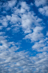 Blue sky and white cotton clouds background. Alicante, Spain.