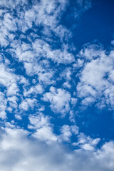 Blue sky and white cotton clouds background. Alicante, Spain.