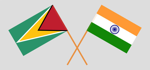 Crossed flags of Guyana and India. Official colors. Correct proportion
