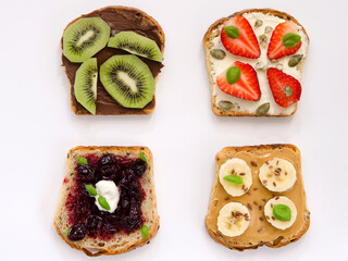appetizing sweet toasts with fruit on a white background