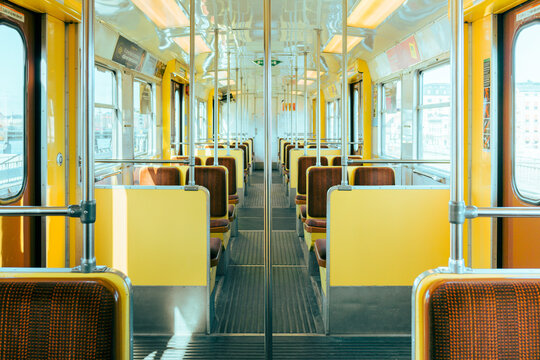 Yellow train on a sunny day.