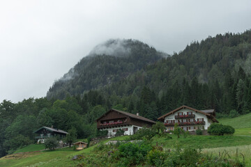 Fototapeta na wymiar Typical bavarian mountain cottages in Berchtesgaden Valley