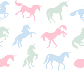 Vector seamless pattern of pastel colored hand drawn unicorn silhouette isolated on white background