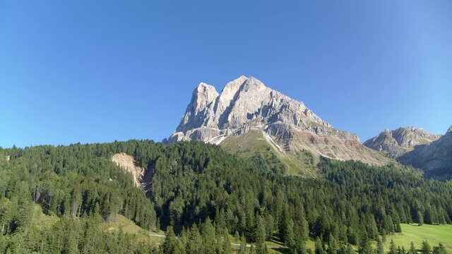 Aerial of mountains in the alps, beautiful mountain above green forest in South Tyrol. Untouched nature in Italy